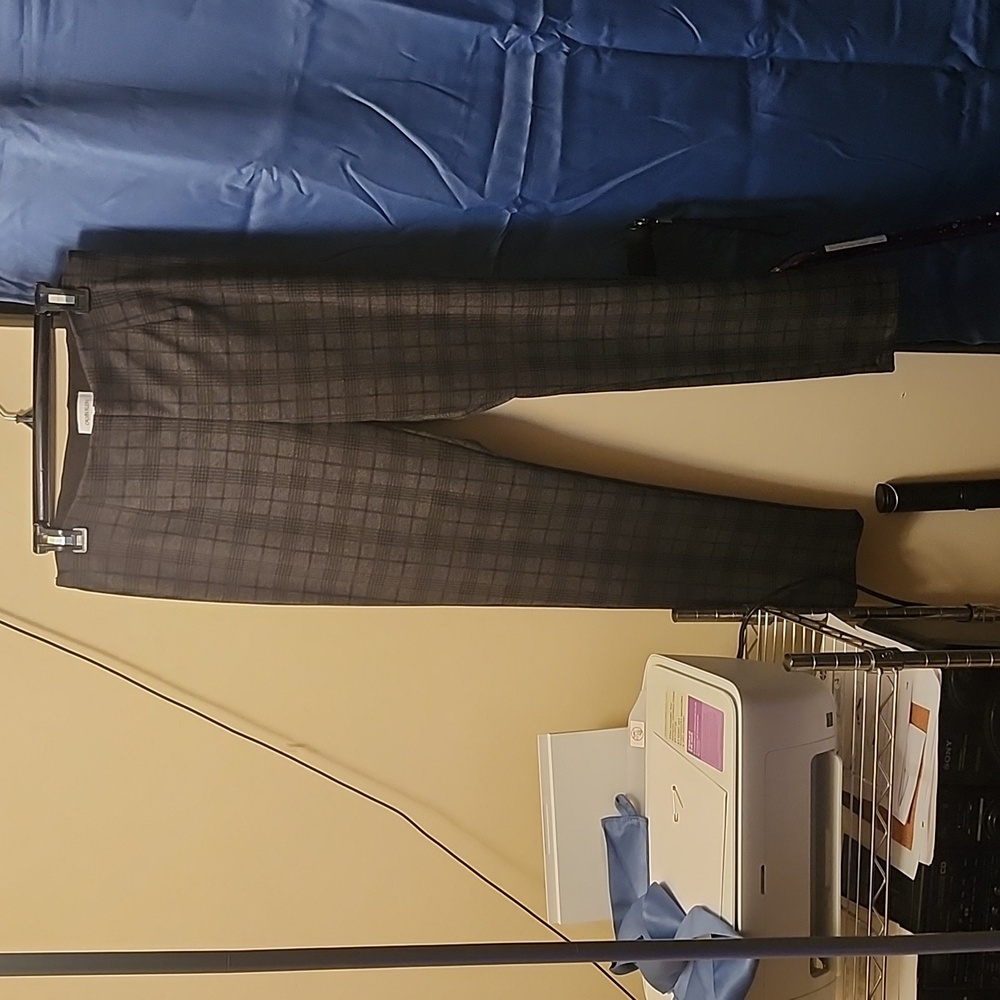 A Pair of black and gray CALVIN KLEIN pants.